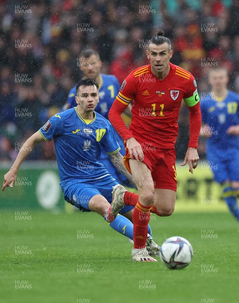 050622 -  Wales v Ukraine, World Cup Qualifying Play Off Final - Gareth Bale of Wales gets away from Mykola Shaparenko of Ukraine
