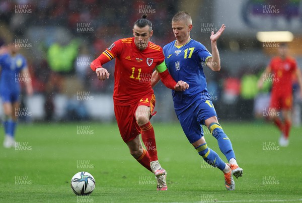 050622 -  Wales v Ukraine, World Cup Qualifying Play Off Final - Gareth Bale of Wales holds off Oleksandr Zinchenko of Ukraine