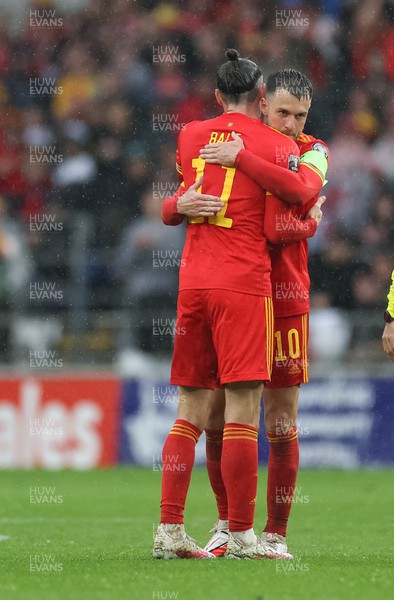 050622 -  Wales v Ukraine, World Cup Qualifying Play Off Final - Gareth Bale of Wales embraces Aaron Ramsey of Wales as he hands over the captaincy before being substituted