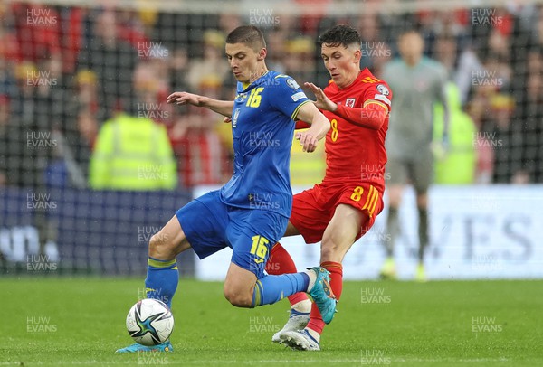 050622 -  Wales v Ukraine, World Cup Qualifying Play Off Final - Vitalii Mykolenko of Ukraine is challenged by Harry Wilson of Wales