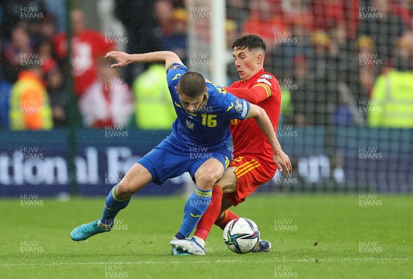 050622 -  Wales v Ukraine, World Cup Qualifying Play Off Final - Vitalii Mykolenko of Ukraine is challenged by Harry Wilson of Wales