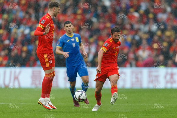 050622 -  Wales v Ukraine, World Cup Qualifying Play Off Final - Joe Allen of Wales passes the ball