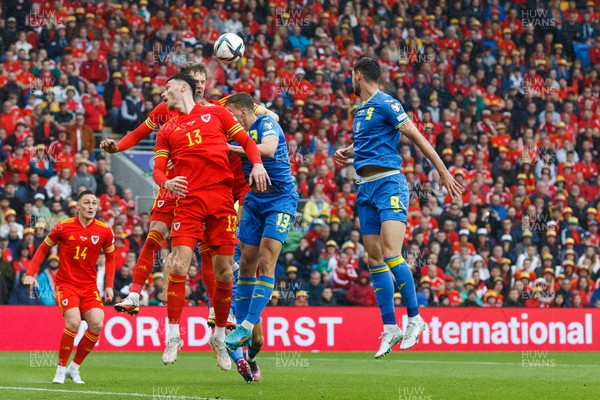 050622 -  Wales v Ukraine, World Cup Qualifying Play Off Final - Kieffer Moore of Wales and Illia Zabarnyi of Ukraine go up for the ball