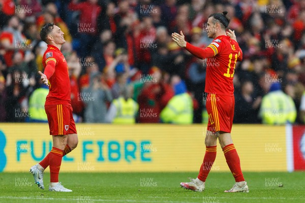 050622 -  Wales v Ukraine, World Cup Qualifying Play Off Final - Gareth Bale and Connor Roberts of Wales celebrate after the final whistle