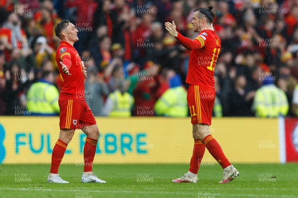050622 -  Wales v Ukraine, World Cup Qualifying Play Off Final - Gareth Bale and Connor Roberts of Wales celebrate after the final whistle