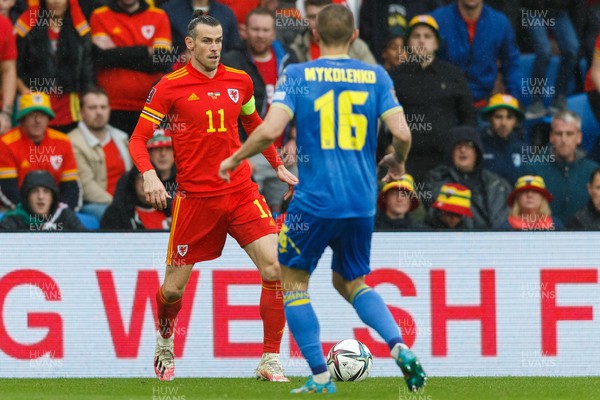 050622 -  Wales v Ukraine, World Cup Qualifying Play Off Final - Gareth Bale of Wales takes on Vitaliy Mykolenko of Ukraine