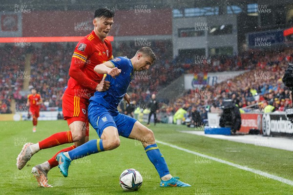 050622 -  Wales v Ukraine, World Cup Qualifying Play Off Final - Kieffer Moore of Wales and Illia Zabarnyi of Ukraine battle for the ball