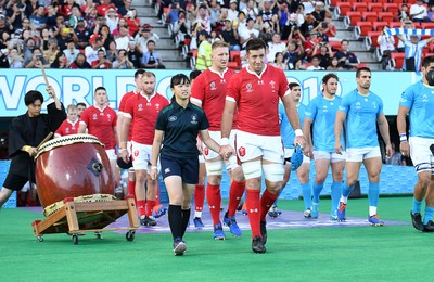 131019 - Wales v Uruguay - Rugby World Cup - Pool D - Justin Tipuric of Wales walks out with mascot