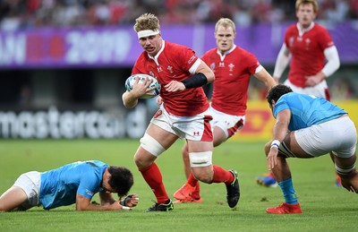 131019 - Wales v Uruguay - Rugby World Cup - Pool D - Aaron Wainwright of Wales gets away from Santiago Civetta of Uruguay