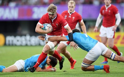 131019 - Wales v Uruguay - Rugby World Cup - Pool D - Aaron Wainwright of Wales gets away from Santiago Civetta of Uruguay