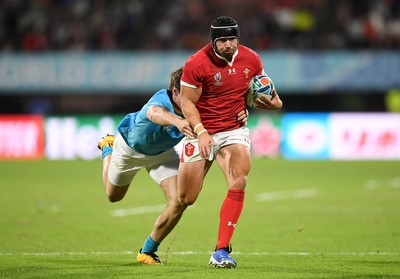 131019 - Wales v Uruguay - Rugby World Cup - Pool D - Leigh Halfpenny of Wales is tackled by Tomas Inciarte of Uruguay