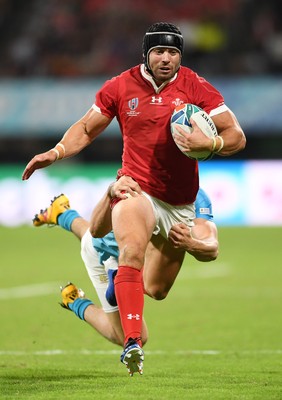 131019 - Wales v Uruguay - Rugby World Cup - Pool D - Leigh Halfpenny of Wales is tackled by Tomas Inciarte of Uruguay