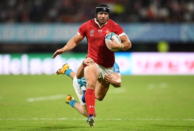 131019 - Wales v Uruguay - Rugby World Cup - Pool D - Leigh Halfpenny of Wales is tackled by Tomas Inciarte of Uruguay