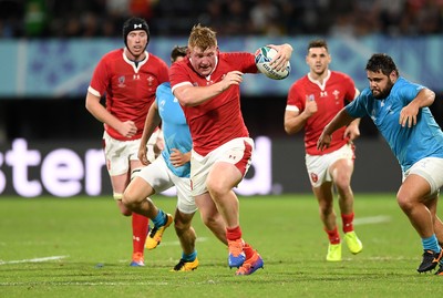 131019 - Wales v Uruguay - Rugby World Cup - Pool D - Rhys Carre of Wales makes a break down the pitch