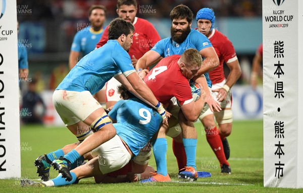 131019 - Wales v Uruguay - Rugby World Cup - Pool D - Bradley Davies of Wales is tackled just before the try line by Santiago Arata and Diego Arbelo of Uruguay