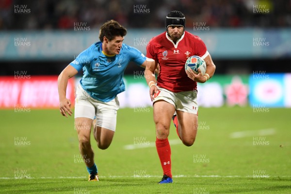 131019 - Wales v Uruguay - Rugby World Cup - Pool D - Leigh Halfpenny of Wales is tackled by Tomas Inciarte of Uruguay