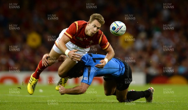 200915 - Wales v Uruguay - Rugby World Cup 2015 -Liam Williams of Wales is tackled by Rodrigo Silva of Uruguay