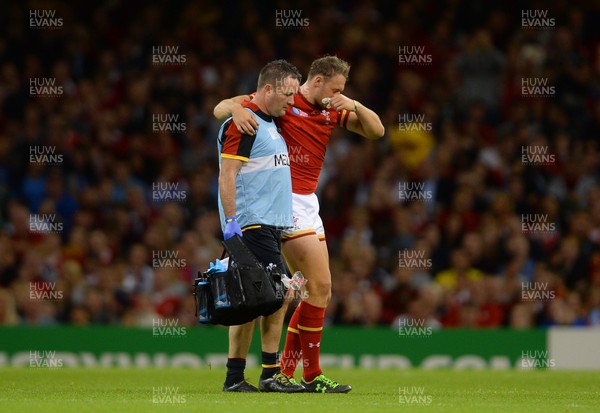 200915 - Wales v Uruguay - Rugby World Cup 2015 -Cory Allen of Wales leaves the field with team doctor Geoff Davies