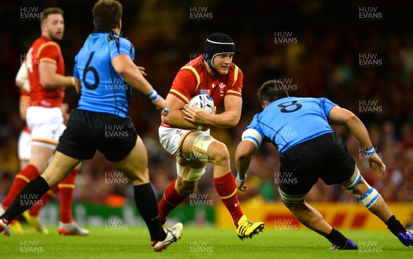 200915 - Wales v Uruguay - Rugby World Cup 2015 -James King of Wales takes on Matias Beer of Uruguay