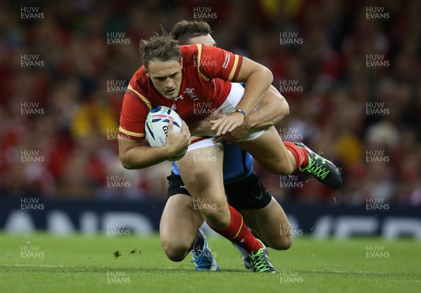 200915 - Wales v Uruguay, Rugby World Cup 2015 - Cory Allen of Wales is tackled by Andres Vilaseca of Uruguay