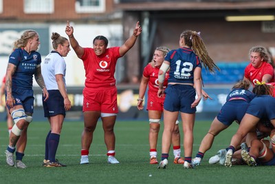 260926 Wales v USA, Vodafone Wales WXV Series - Sisilia Tuipulotu and Alex Callender of Wales appeal to referee Amber McLachlan late in the match
