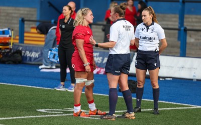 260926 Wales v USA, Vodafone Wales WXV Series - Wales co-captain Alex Callender speaks to referee Amber McLachlan at the end of the match