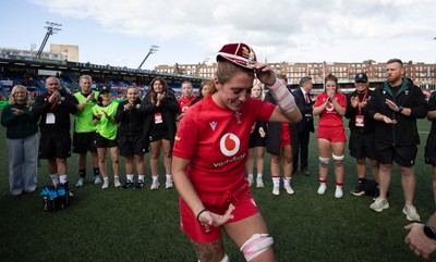260926 Wales v USA, Vodafone Wales WXV Series - Georgia Evans of Wales is presented with her 50th cap by Sean Lynn, Wales head coach