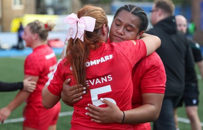260926 Wales v USA, Vodafone Wales WXV Series - Sisilia Tuipulotu of Wales and Georgia Evans of Wales at the end of the match