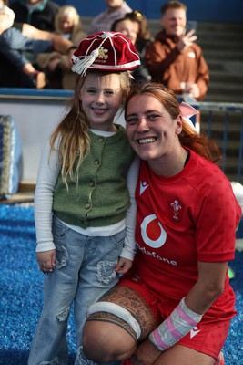 260926 Wales v USA, Vodafone Wales WXV Series - Georgia Evans of Wales with niece Ella-May and her 50 cap at the end of the match