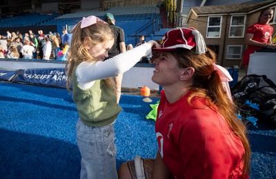 260926 Wales v USA, Vodafone Wales WXV Series - Georgia Evans of Wales with niece Ella-May and her 50 cap at the end of the match