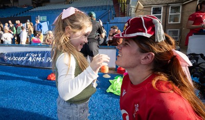 260926 Wales v USA, Vodafone Wales WXV Series - Georgia Evans of Wales with niece Ella-May and her 50 cap at the end of the match
