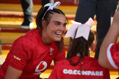 260926 Wales v USA, Vodafone Wales WXV Series - Bryonie King of Wales with a young fan at the end of the match