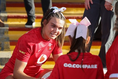 260926 Wales v USA, Vodafone Wales WXV Series - Bryonie King of Wales with a young fan at the end of the match