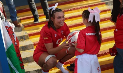 260926 Wales v USA, Vodafone Wales WXV Series - Bryonie King of Wales with a young fan at the end of the match