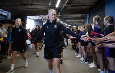 260926 Wales v USA, Vodafone Wales WXV Series - Nikita Prothero of Wales is greeted by fans as she walks to the stadium