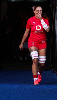 260926 Wales v USA, Vodafone Wales WXV Series - Georgia Evans of Wales leads the team out on her 50th cap