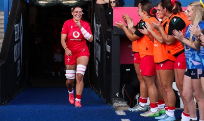 260926 Wales v USA, Vodafone Wales WXV Series - Georgia Evans of Wales leads the team out on her 50th cap