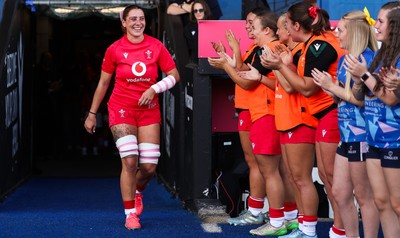 260926 Wales v USA, Vodafone Wales WXV Series - Georgia Evans of Wales leads the team out on her 50th cap