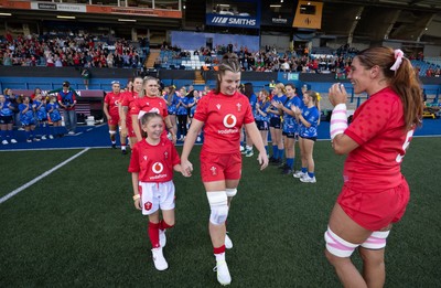 260926 Wales v USA, Vodafone Wales WXV Series - Wales co-captain Kate Williams walks out with the match mascot