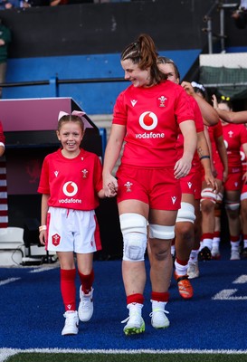 260926 Wales v USA, Vodafone Wales WXV Series - Wales co-captain Kate Williams walks out with the match mascot