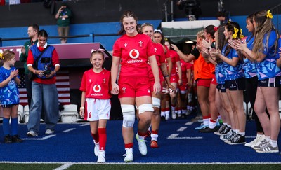 260926 Wales v USA, Vodafone Wales WXV Series - Wales co-captain Kate Williams walks out with the match mascot