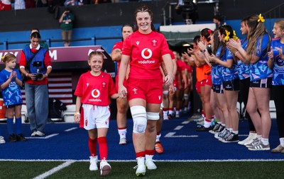 260926 Wales v USA, Vodafone Wales WXV Series - Wales co-captain Kate Williams walks out with the match mascot