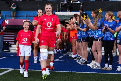 260926 Wales v USA, Vodafone Wales WXV Series - Wales co-captain Kate Williams walks out with the match mascot