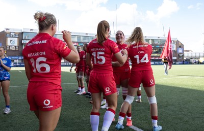 260926 Wales v USA, Vodafone Wales WXV Series - Georgia Evans of Wales greets her team mates as they walk out at the start of the match