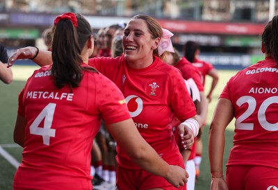 260926 Wales v USA, Vodafone Wales WXV Series - Georgia Evans of Wales greets her team mates as they walk out at the start of the match