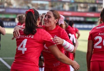 260926 Wales v USA, Vodafone Wales WXV Series - Georgia Evans of Wales greets her team mates as they walk out at the start of the match