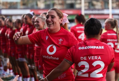 260926 Wales v USA, Vodafone Wales WXV Series - Georgia Evans of Wales greets her team mates as they walk out at the start of the match