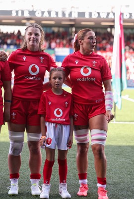 260926 Wales v USA, Vodafone Wales WXV Series - Kate Williams of Wales and Georgia Evans of Wales with the match mascot during the anthems