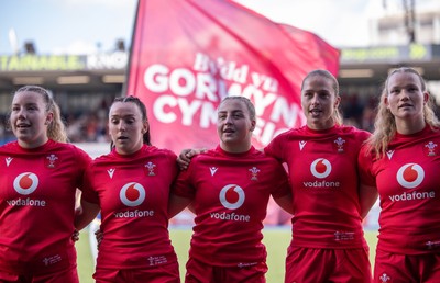 260926 Wales v USA, Vodafone Wales WXV Series - Elan Jones of Wales, Sian Jones of Wales, Molly Reardon of Wales, Lisa Neumann of Wales and Carys Cox of Wales during the anthems