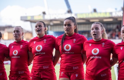 260926 Wales v USA, Vodafone Wales WXV Series - Nikita Prothero of Wales, Branwen Metcalfe of Wales, Jorja Aiono of Wales, and Elan Jones of Wales during the anthems